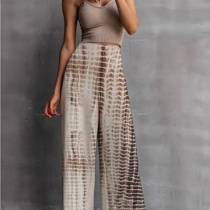 Cute multi color pants.  Slit in bottom of pants